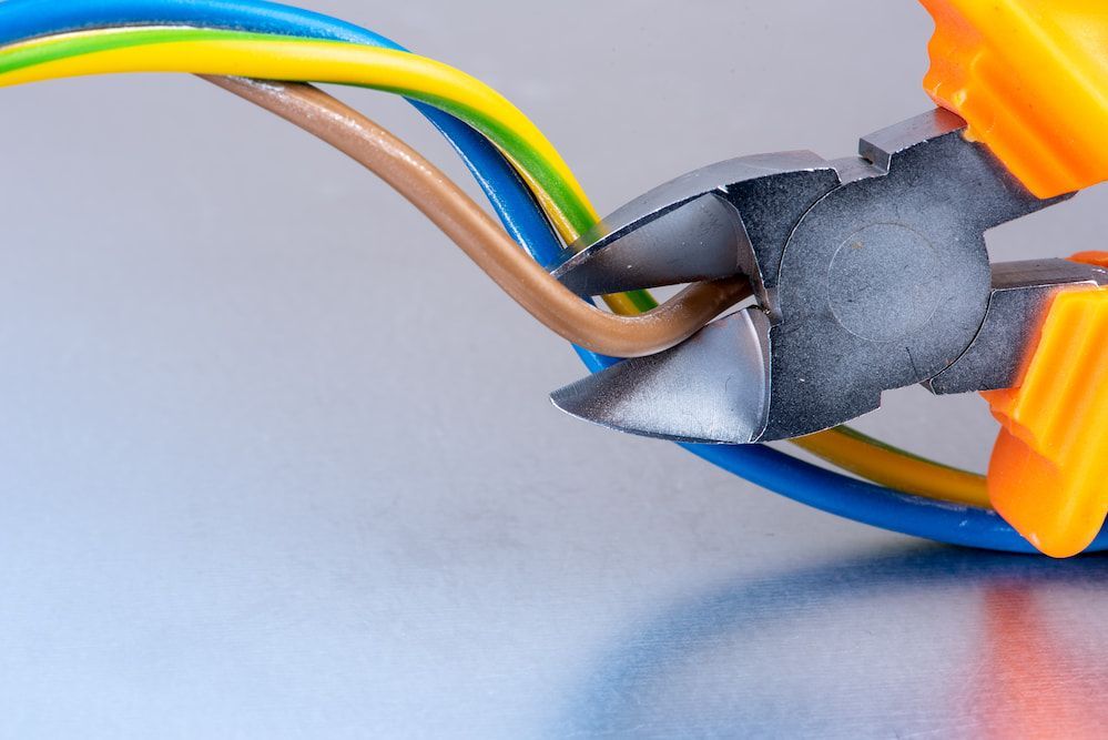Electrician at Work on Switches and Sockets — Jason Wenta Electrical Services in Condon, QLD