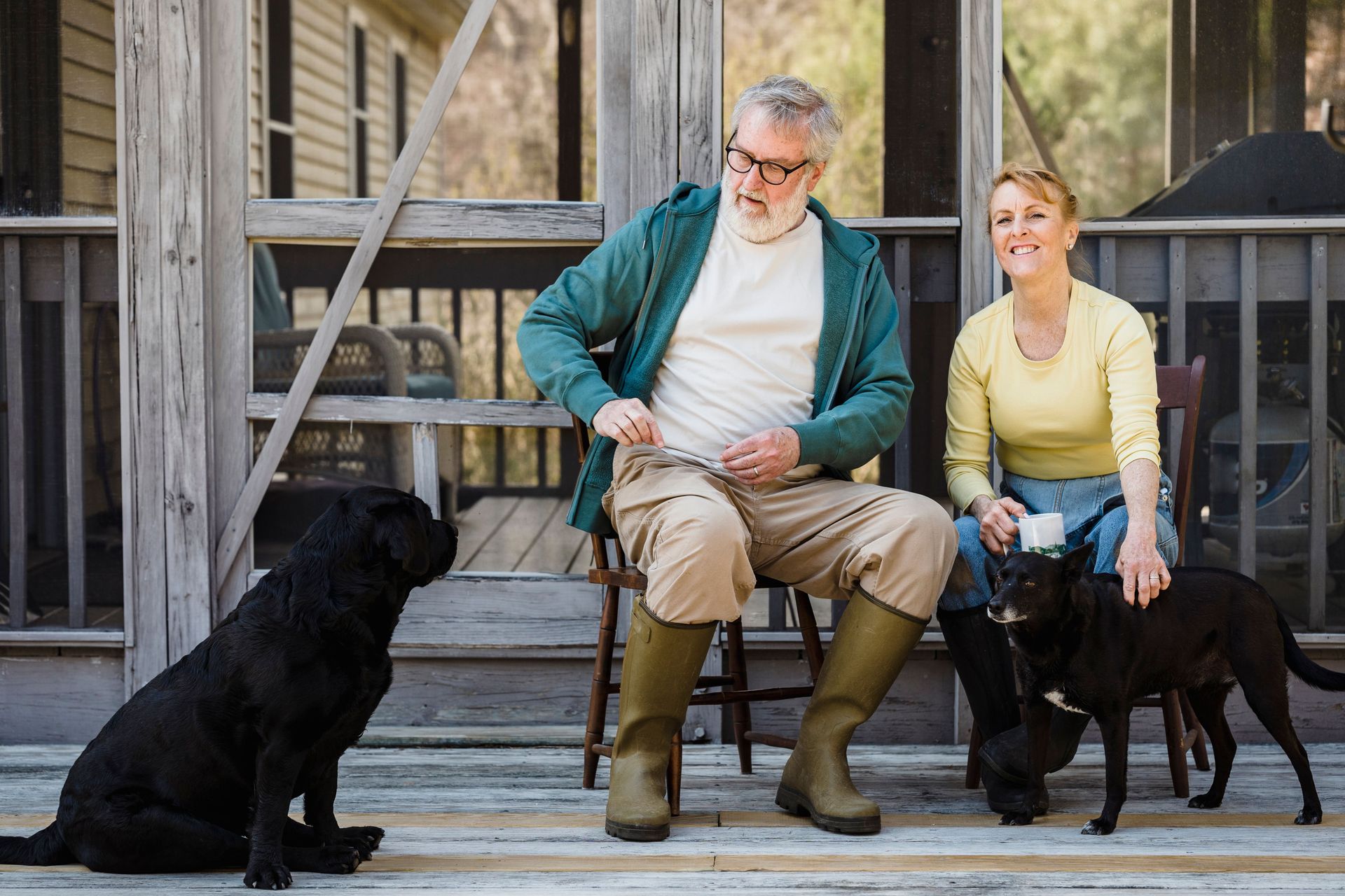 Senior Colorado couple at peace on their porch, having planned for final expenses.