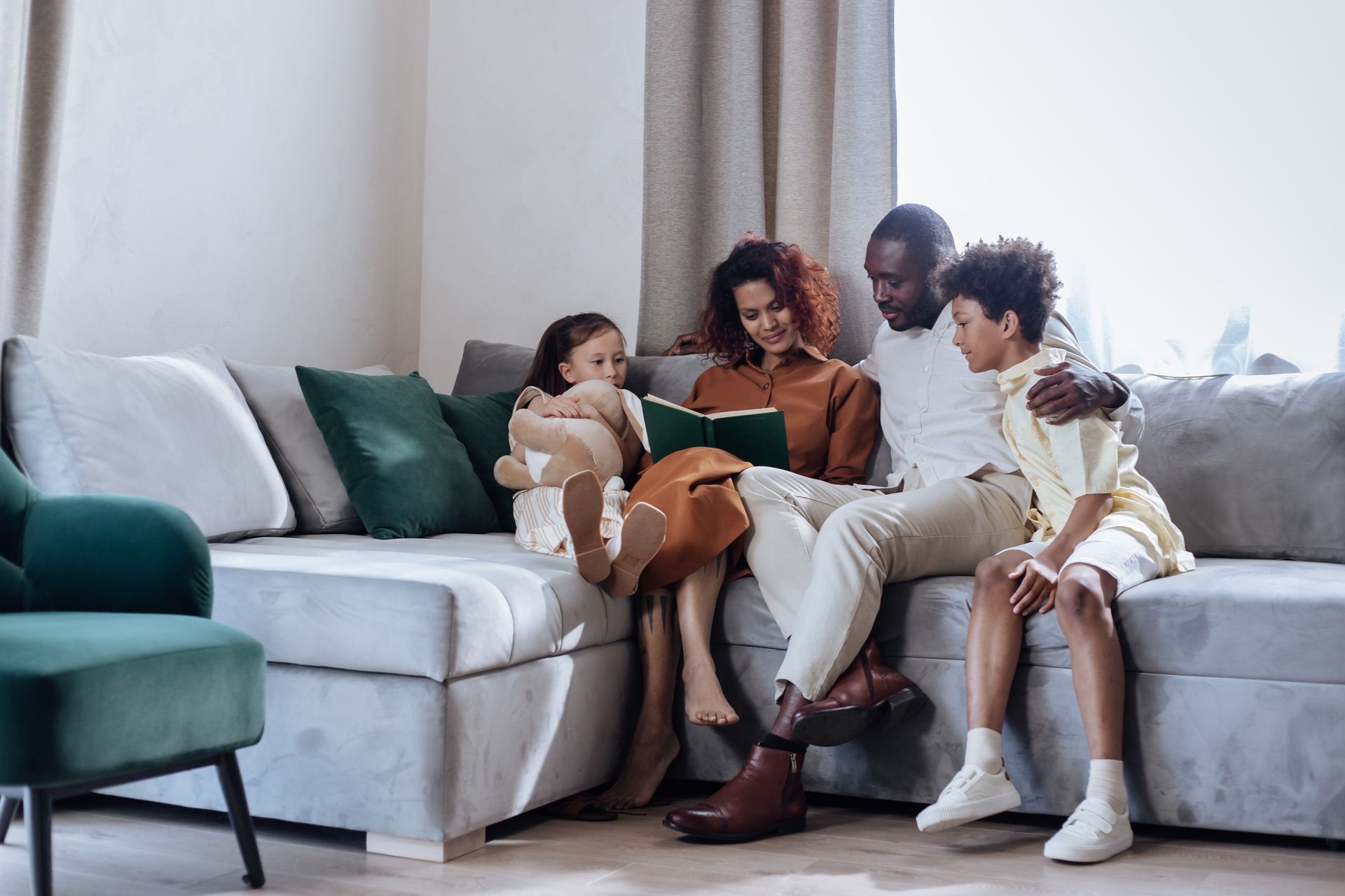 Colorado family relaxing at home, secure with a well-built mix of health and supplemental coverage.