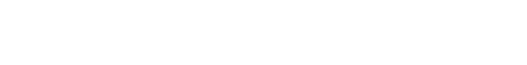 Minimalist pale beige horizontal gradient strip with a small dark vertical line near the left edge.