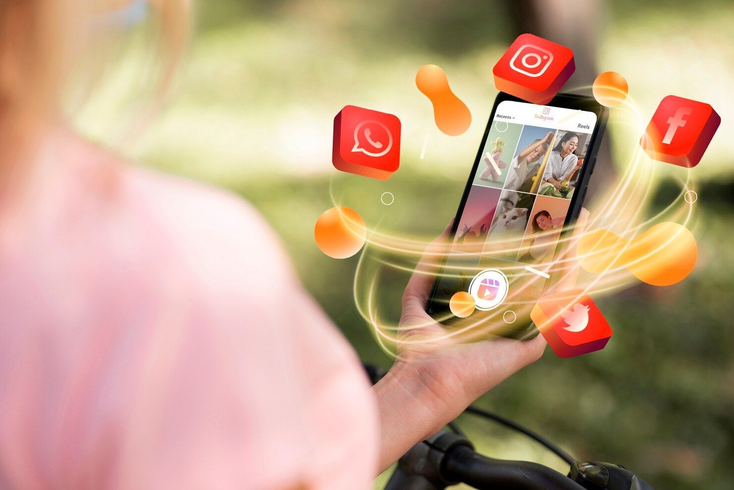 Person holding a smartphone with social media icons floating around it outdoors