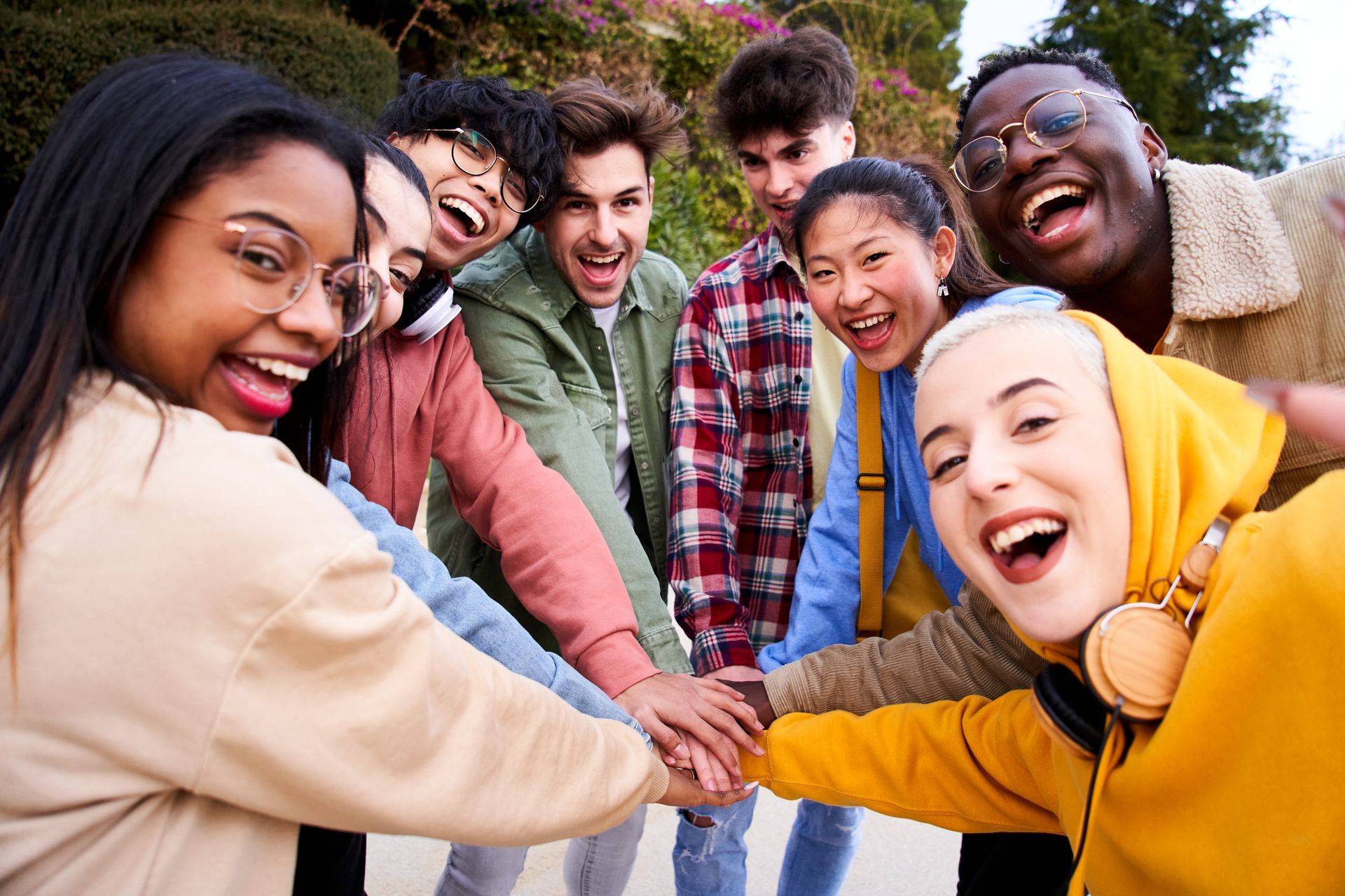 Diverse group of people smiling and supporting each other representing community and connection
