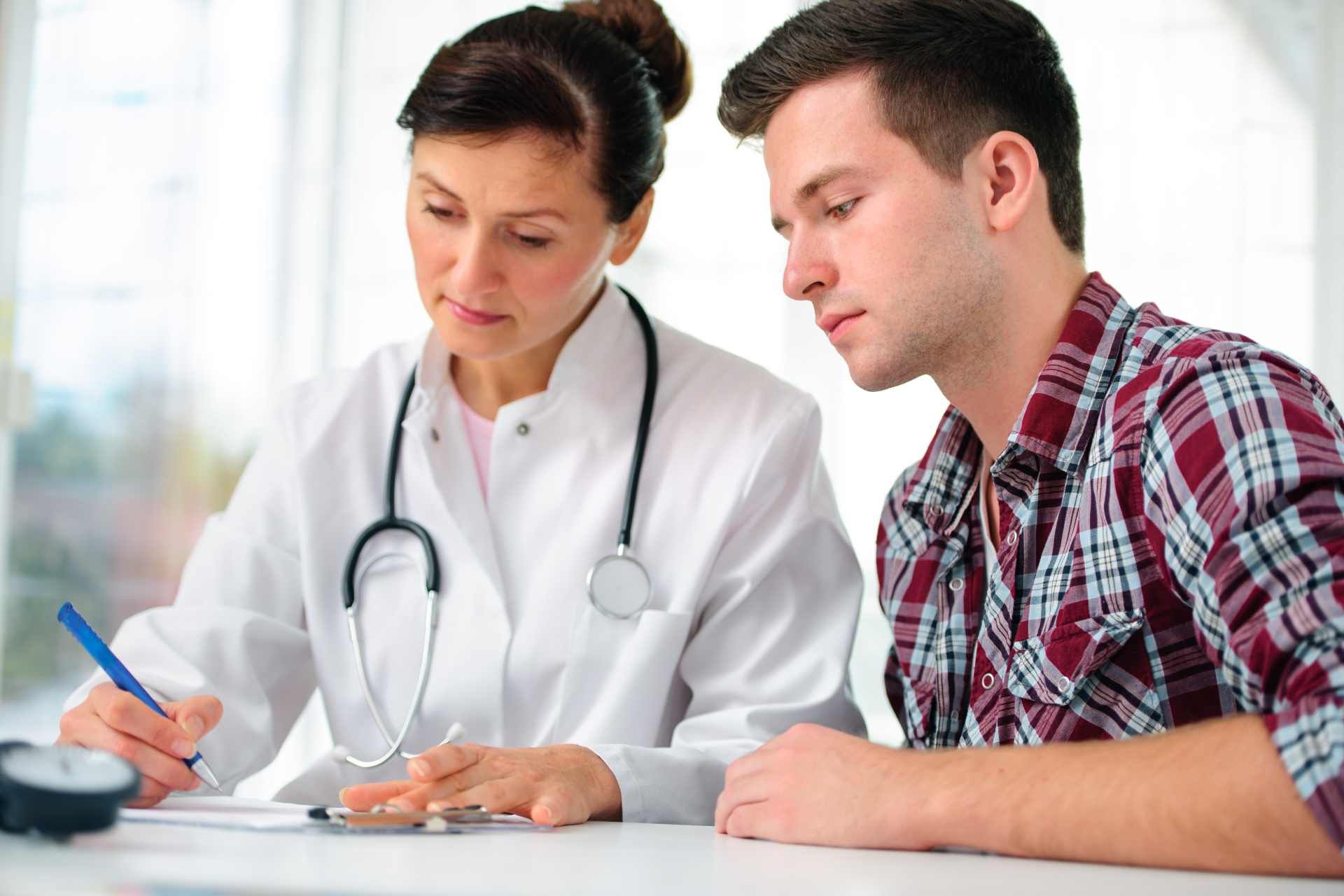 A doctor in an addiction treatment clinic discussing medically assisted treatment near Danville, Ken