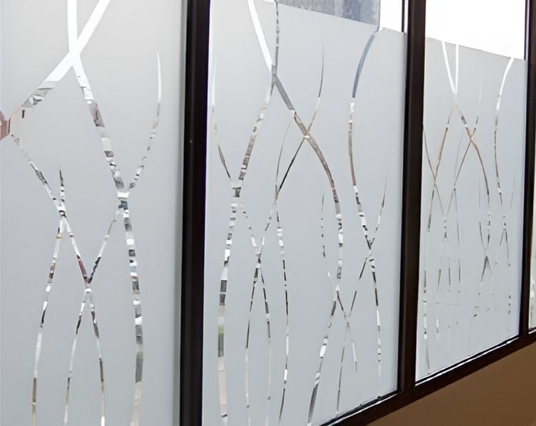 A Row Of Windows With A Frosted Glass Design On Them — A & C Classic Window Tinting In Maitland Vale, NSW