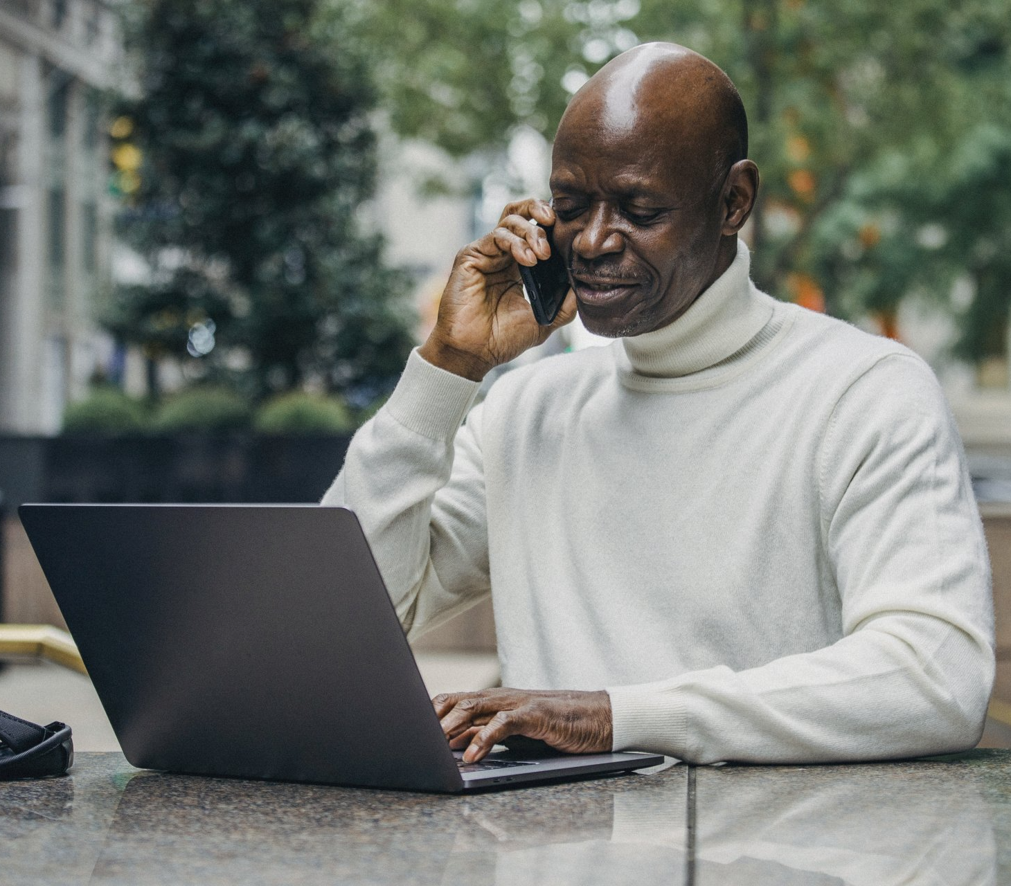 older man on computer
