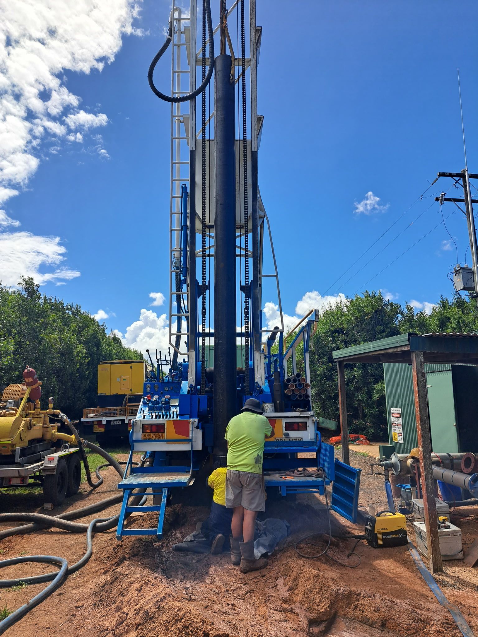 Drilling Rig at Work in A Dirt Area with Blue Sky — Wilson's Drilling in South Kolan, QLD