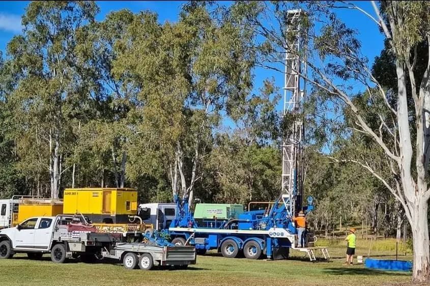 Drilling Rig Set Up in a Grassy Field — Wilson's Drilling in South Kolan, QLD