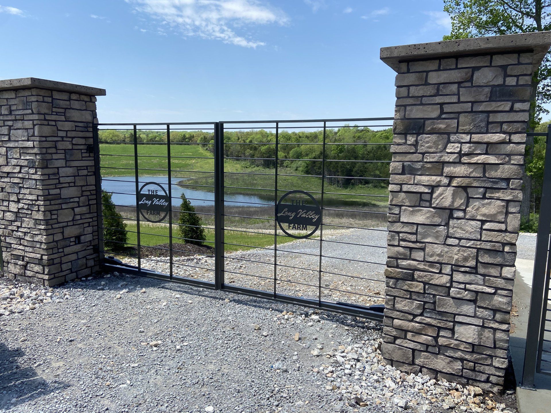 Give Your Home a Strong Sense of Security With a Stonework Gate by KV Construction in Columbia, MO.