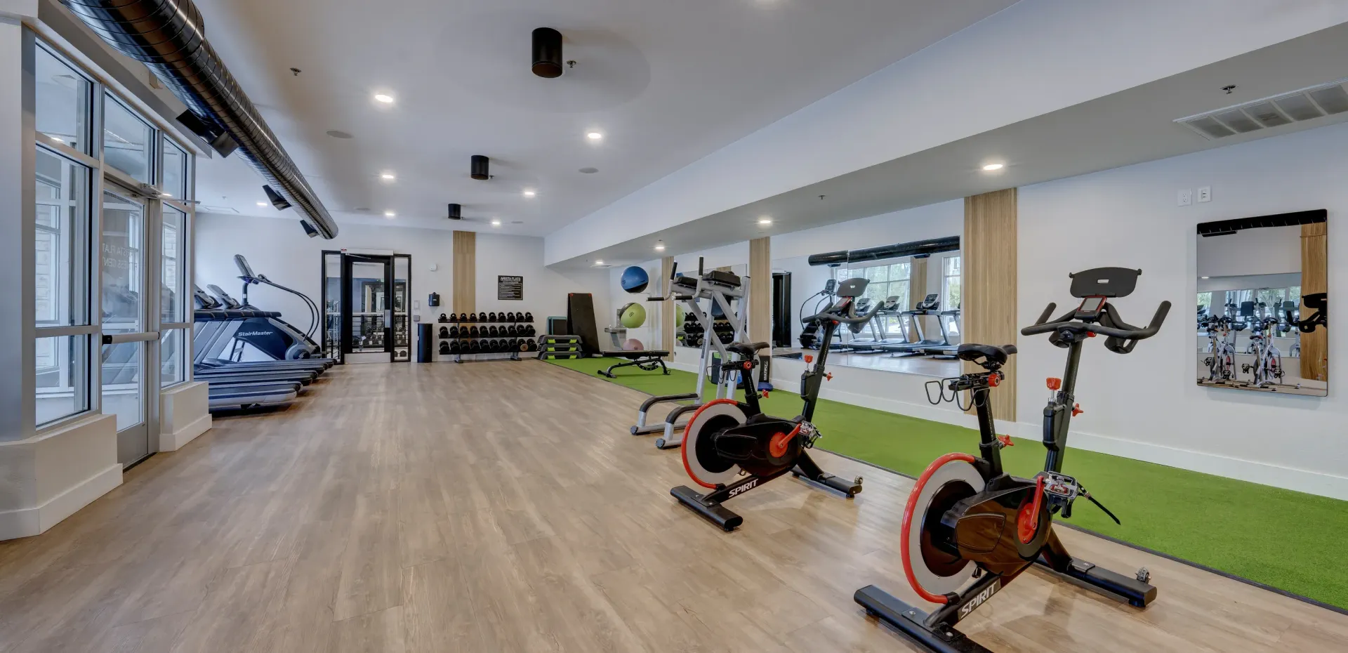 State-of-the-art fitness center with treadmills, stationary bikes, and free weights.
