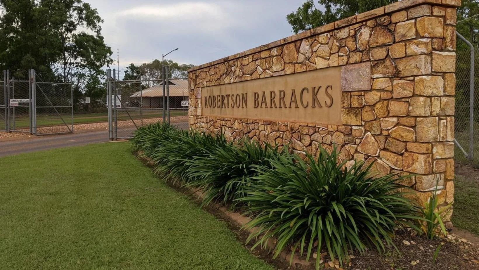 A stone sign reading