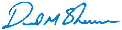 A blue, handwritten signature reading 