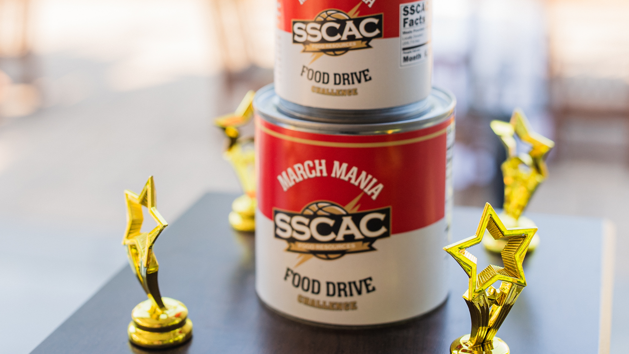 Two stacked cans labeled
