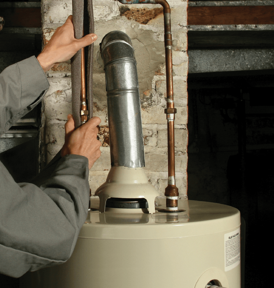 Worker repairing a furnace