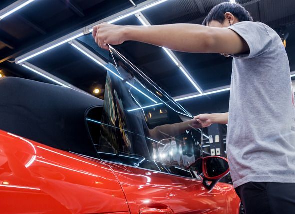 Tinting window red car