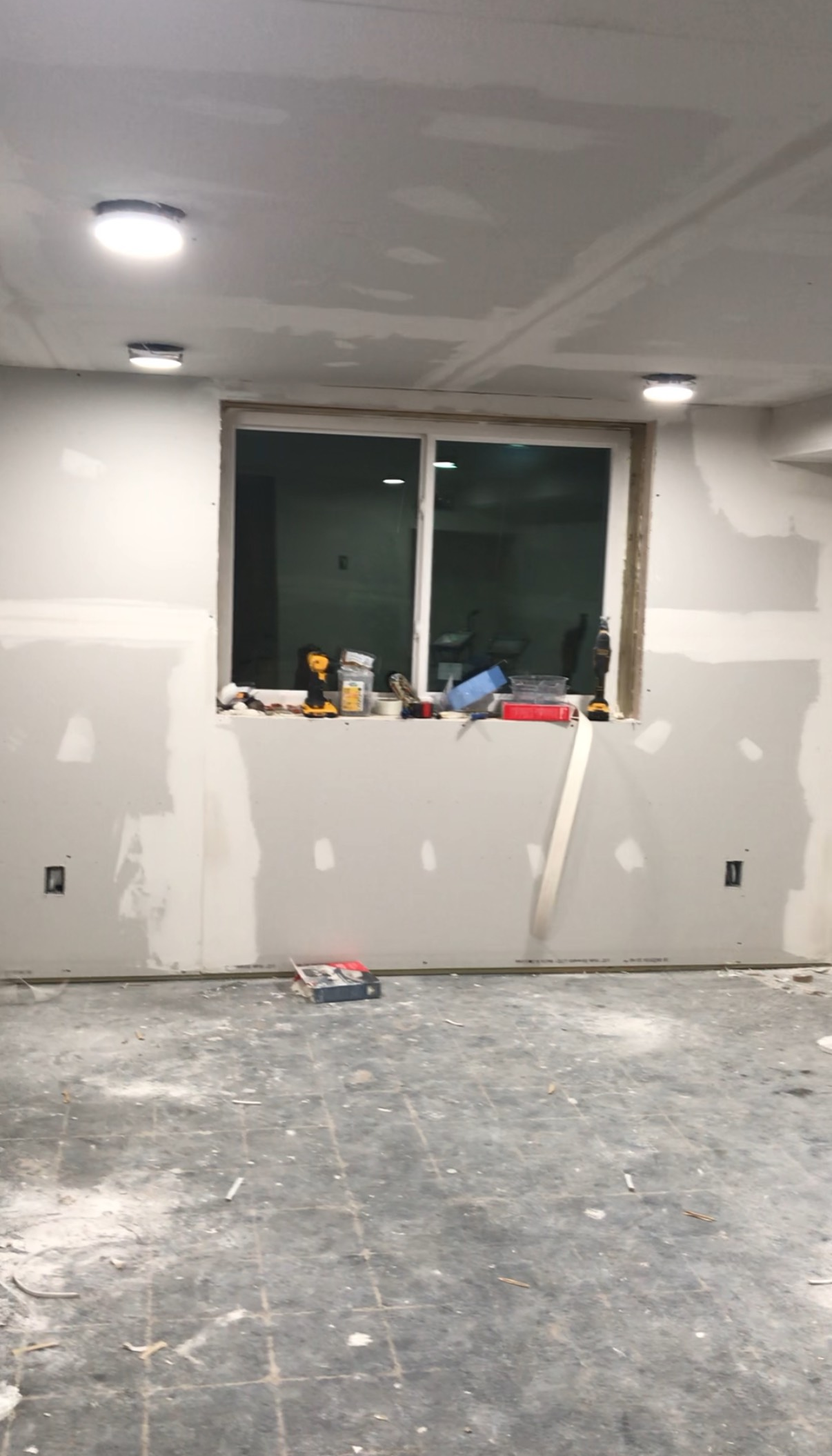 There is a window in the middle of the room.