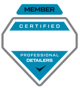 Badge for certified professional detailers; blue, gray, and white colors. Diamond shape, with 