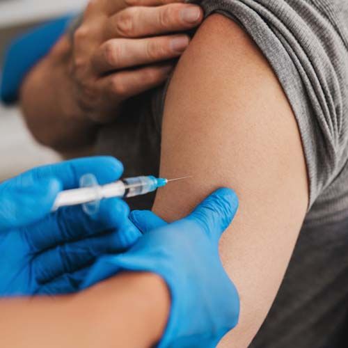 Doctor giving an injection