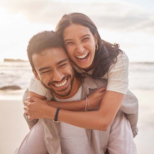 Shot of a couple enjoying a day at the beach