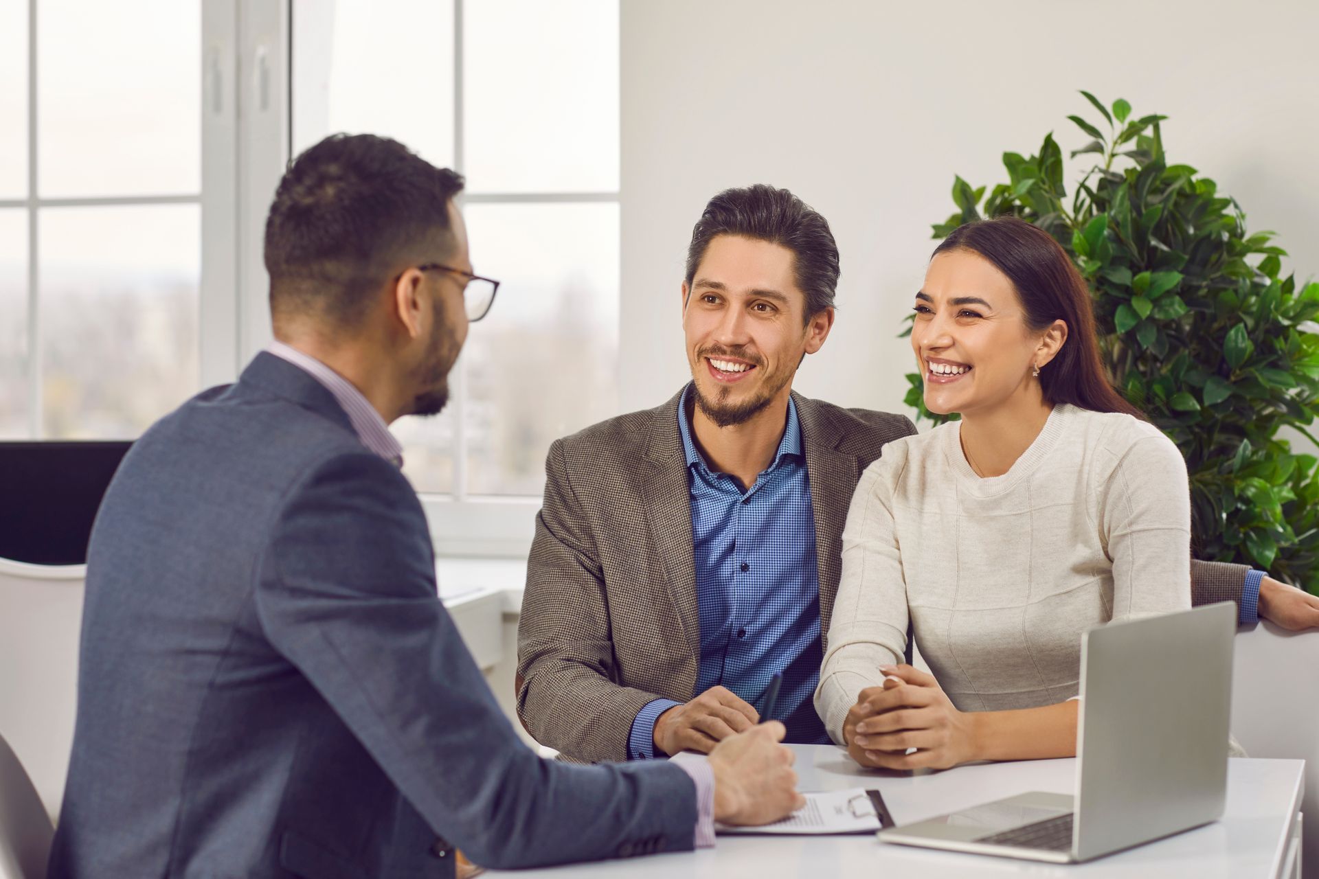 Couple Talking to Agent