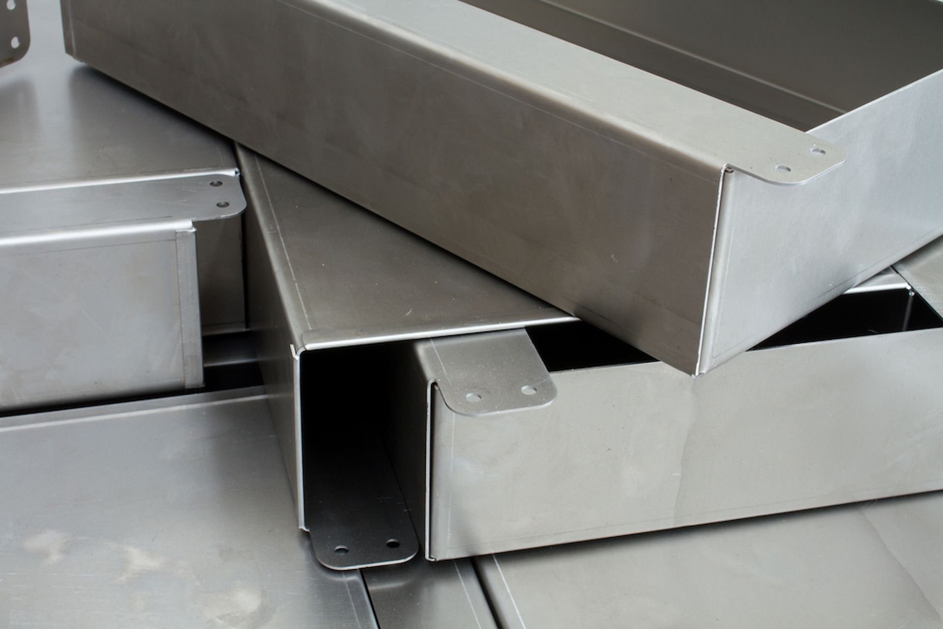 A Bunch of Stainless Steel Boxes Are Stacked on Top of Each Other — Metaltrendz in Noosa, QLD