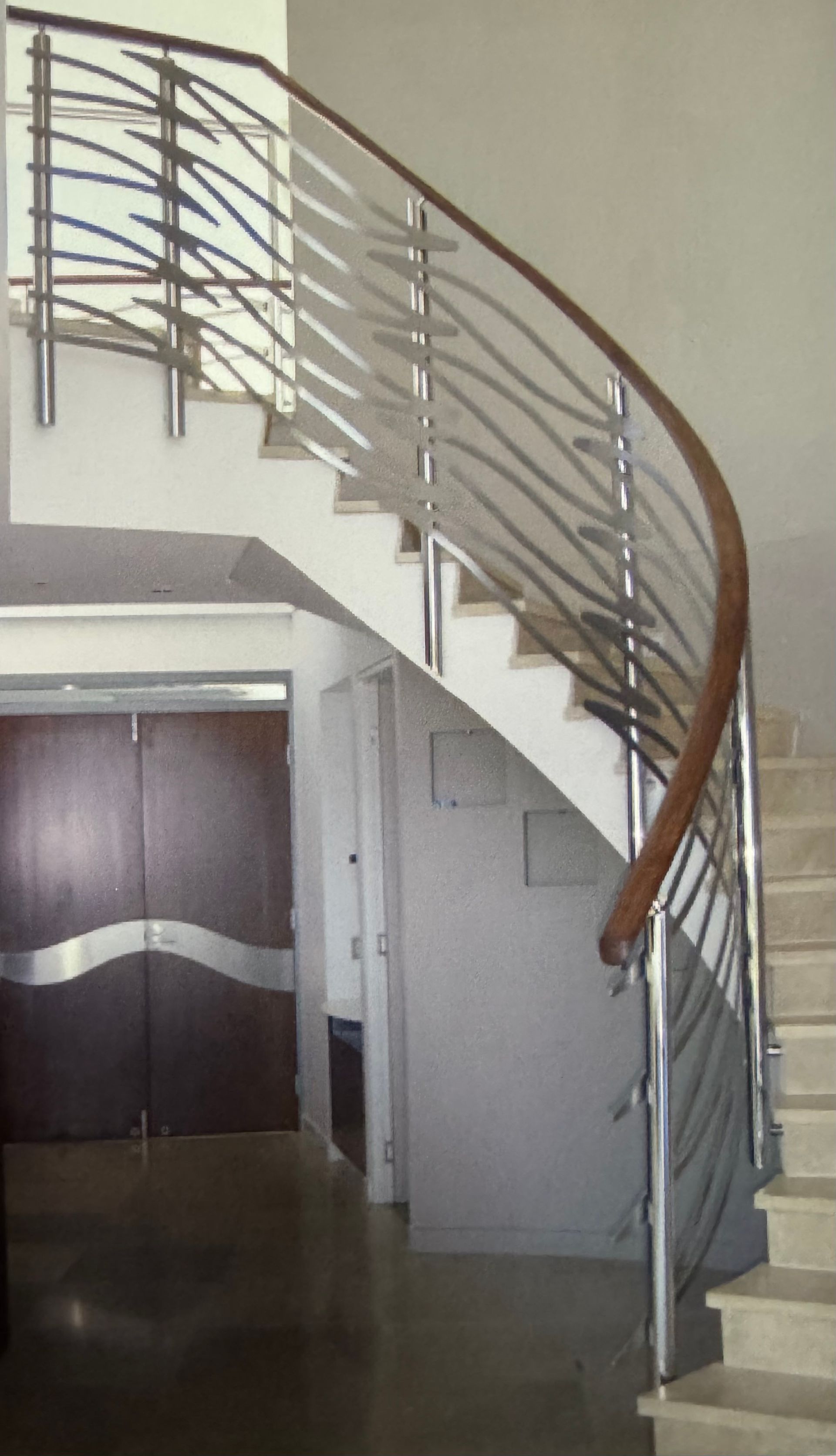 Curved staircase with stainless steel and wood railing, leading up — Metaltrendz in Kunda Park, QLD