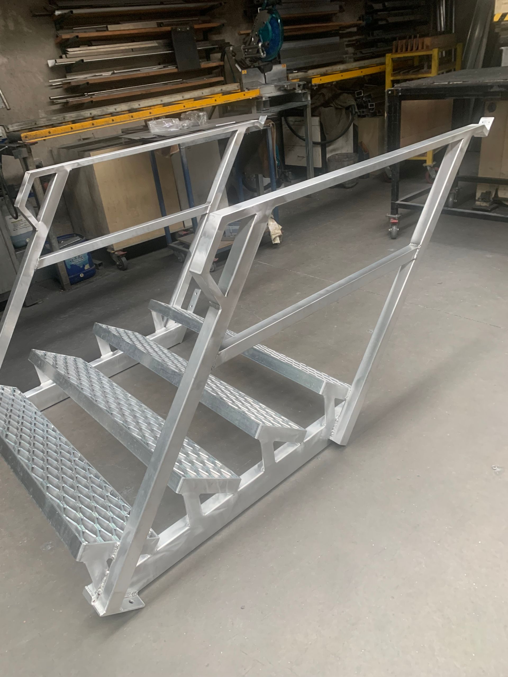 Metal staircase with handrails in a workshop — Metaltrendz in Kunda Park, QLD