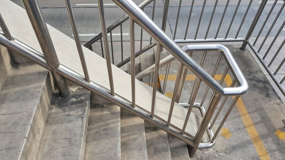 A Set of Stairs With a Stainless Steel Railing Going Up and Down — Metaltrendz in Kunda Park, QLD