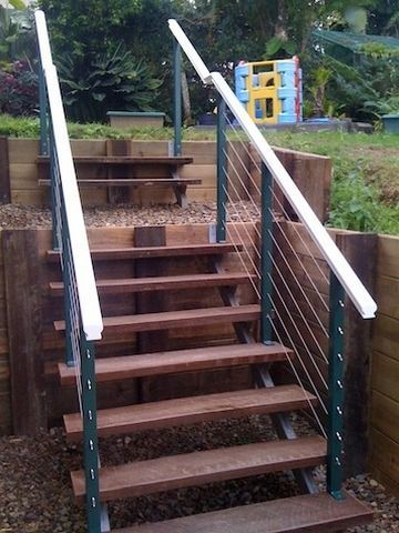 A Set of Wooden Stairs With a Metal Railing — Metaltrendz in Kunda Park, QLD