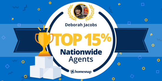 Deborah Jacobs, top 15% nationwide agent, gold trophy on white cubes, blue background with confetti.