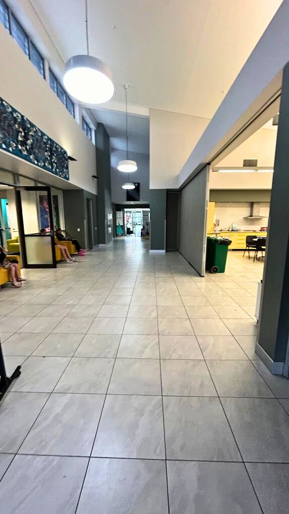 A Large Office With Lots of Desks and Chairs — Schmucker Cleaning in Gulliver, QLD