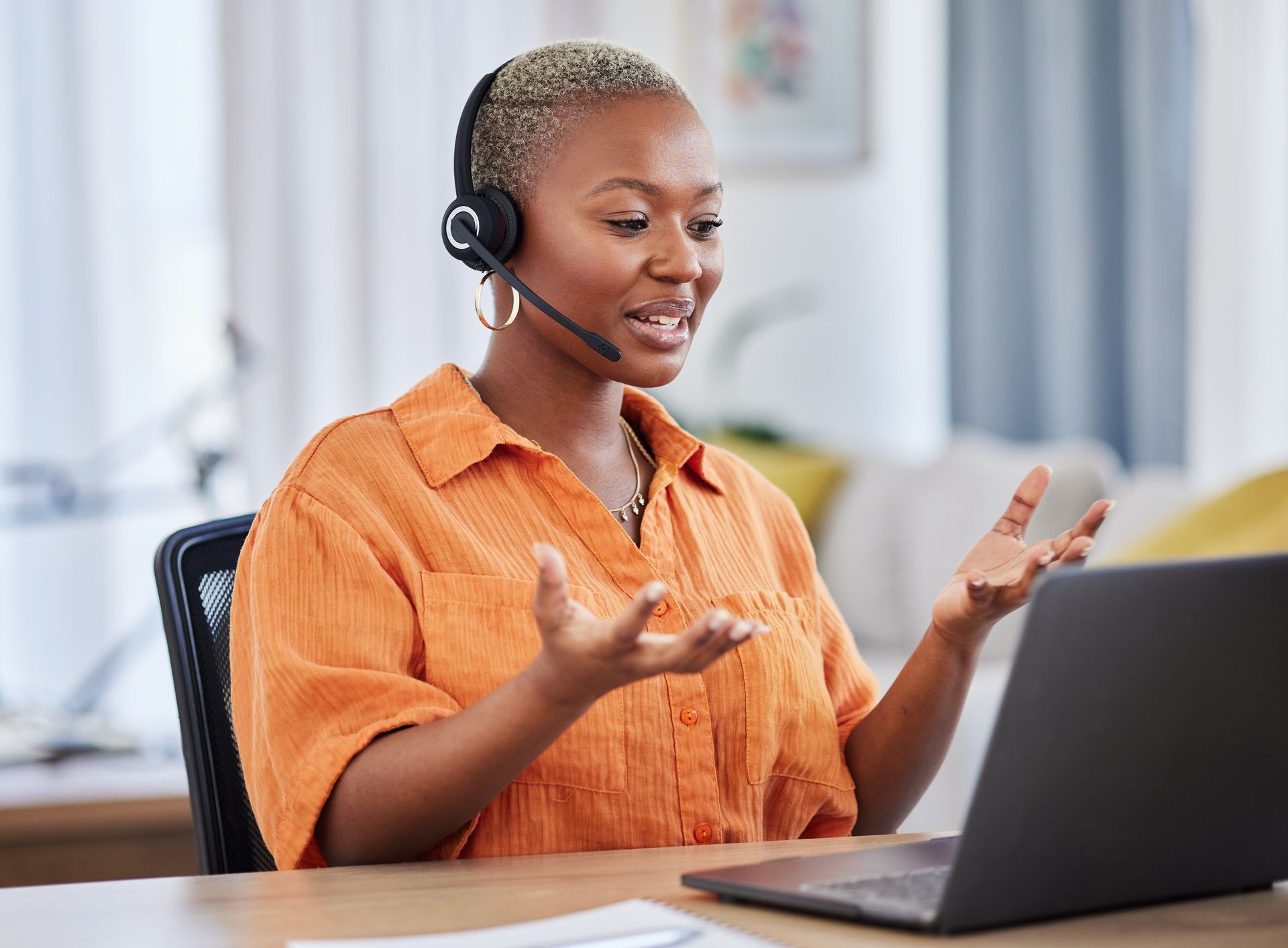 Black woman, call center and consulting on laptop in customer service, support or telemarketing at