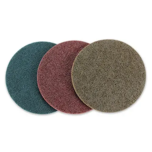 Three overlapping abrasive sanding discs in teal, maroon, and gray on a white background