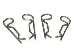 Four metal wire clips arranged in a row on a white background.