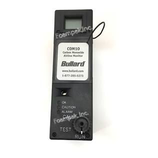 Black Bullard CO monitor with labeled buttons and display mounted on a white wall
