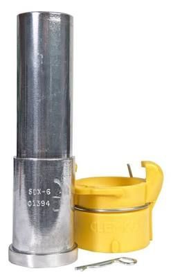 Metal cylindrical tool and yellow plastic connector on a white background