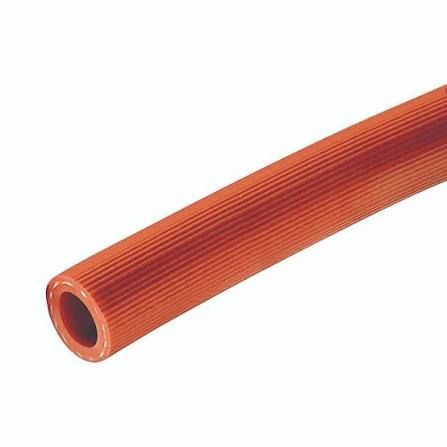 Orange ribbed flexible hose on a white background