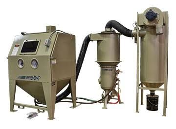 Industrial sandblasting and dust collection system with tan metal cabinets, hoses, and cylindrical filters