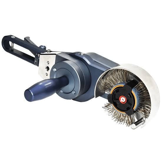Handheld pipe threading machine with blue handle and wire brush wheel attachment