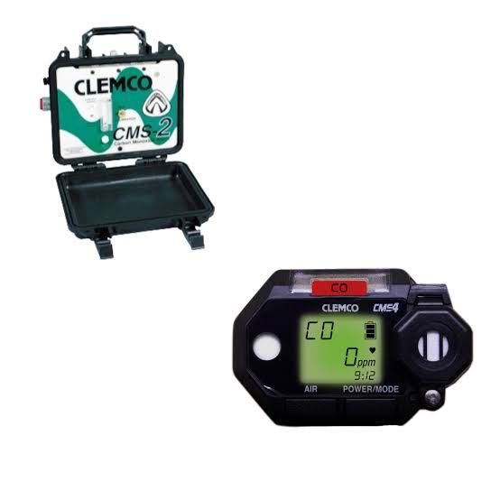 Clemco portable monitor and black handheld meter on a white background