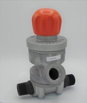 Metal valve with orange cap and black side ports on a gray background