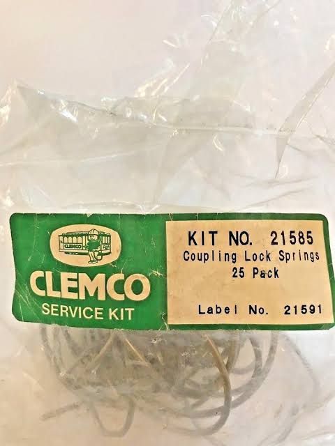 Clear plastic bag with a green Clemco service kit label and small metal springs inside.