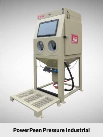 Industrial pressure-washing cabinet with touchscreen, round ports, and open grated foot platform