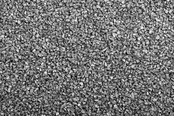 Close-up of gray gravel stones filling the frame