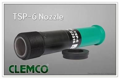 TSP-6 Nozzle, black and green CLEMCO industrial spray nozzle with cap on gray background
