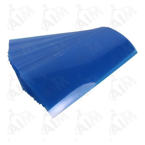 Blue corrugated plastic sheet, rectangular and slightly curved