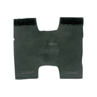 Dark green padded garment panel with a center cutout and black trim