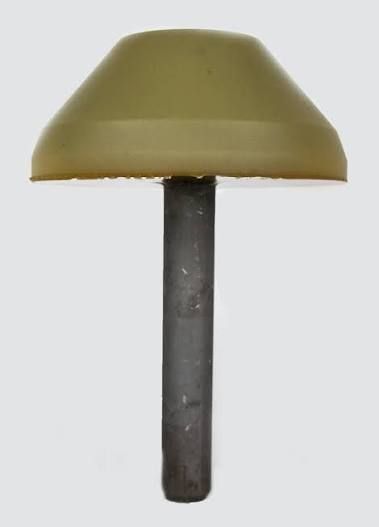Olive-green mushroom-shaped cap on a dark metal rod, isolated on white background