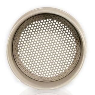 Round perforated metal strainer insert with a beige rim, viewed from above