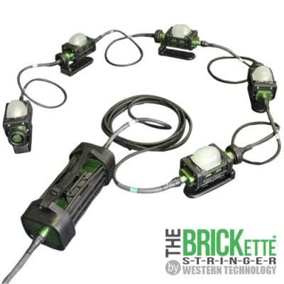 LEGO Star Wars buildable blaster with six green-lit pods on a black cable and battery pack