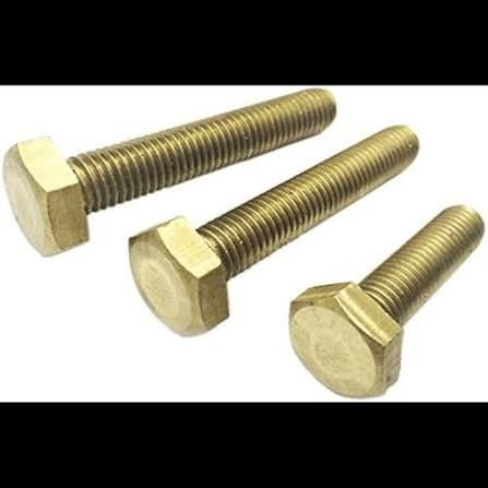 Three brass hex-head bolts on a white background